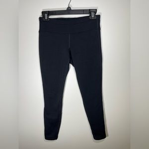 Athleta black fleece lined leggings with zipper in the back size small